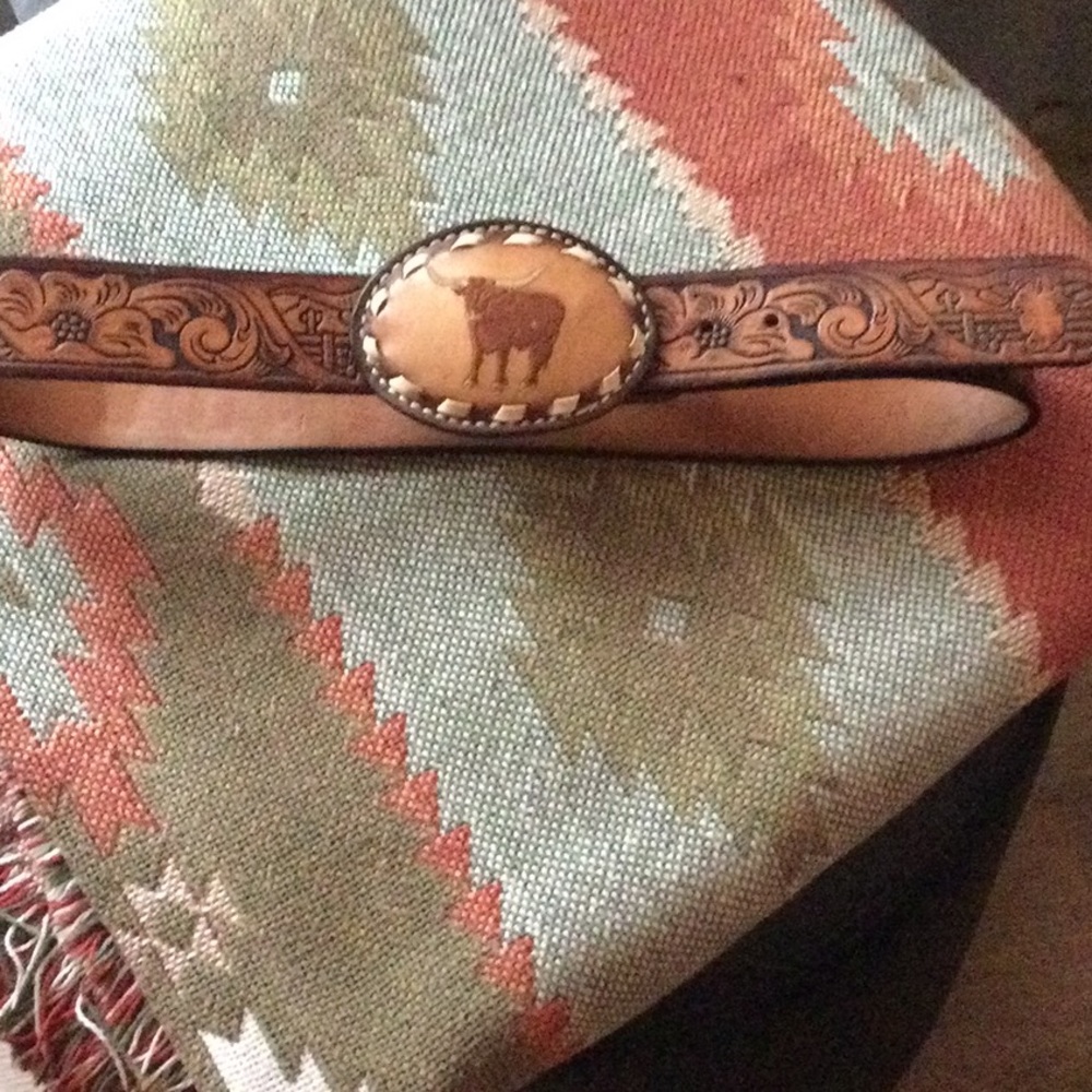Genuine leather western belt with the engraving of Judy on back.